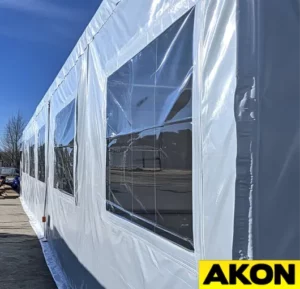 white-tarps-with-clear-with-clear-windows-for-wind-blocking